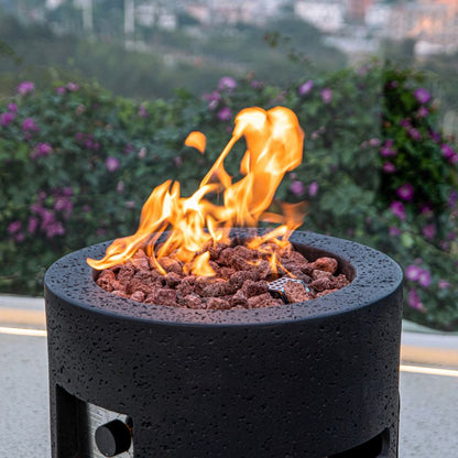 Modeno Lava Tube Fire Pit with lava rocks and flame